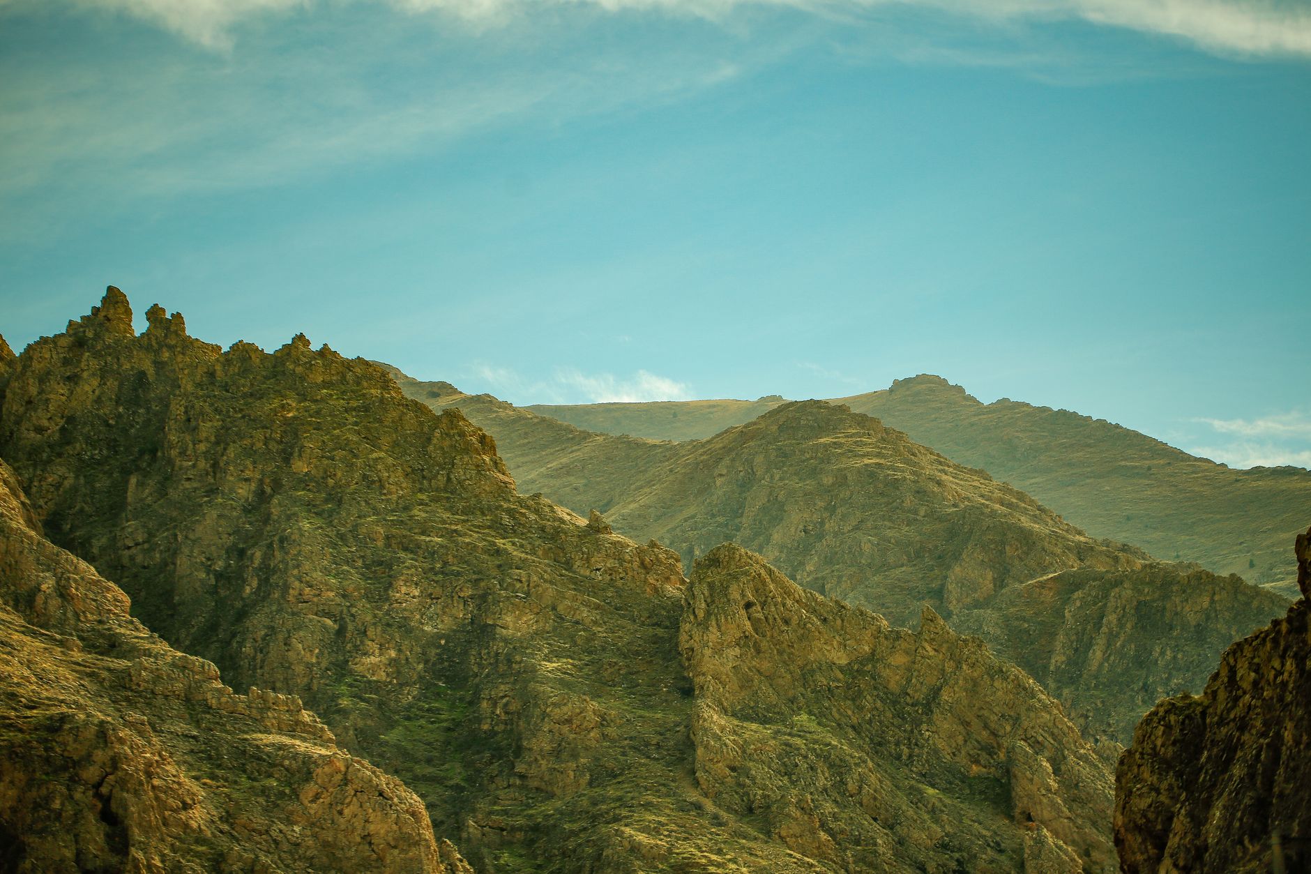 Panoramic view of rugged mountains and serene nature